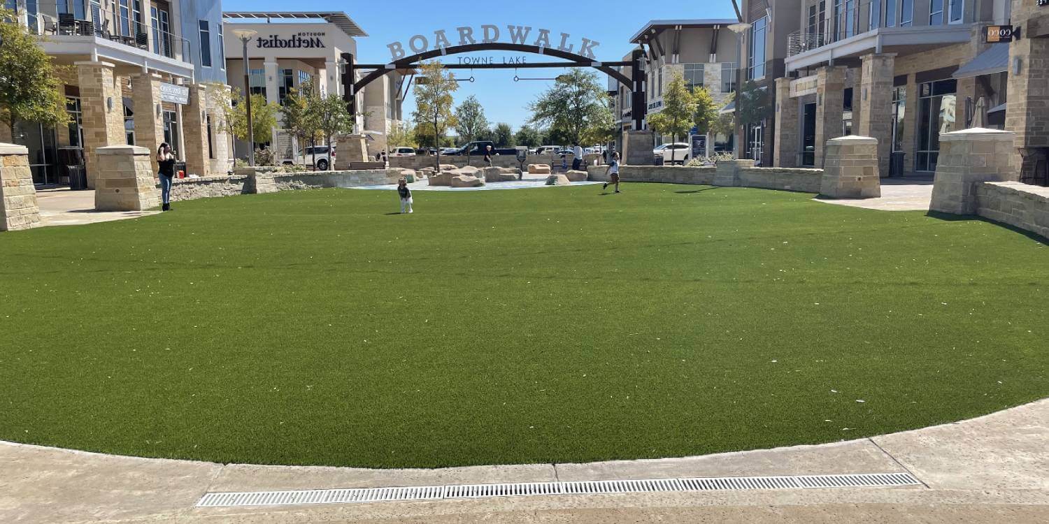 Artificial grass boardwalk area