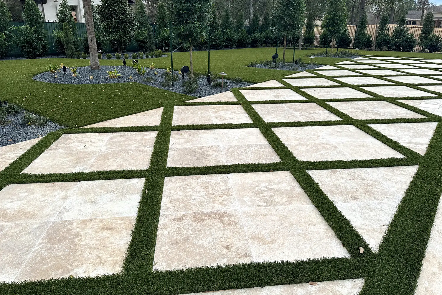 Artificial grass lawn & walkway installed by SYNLawn
