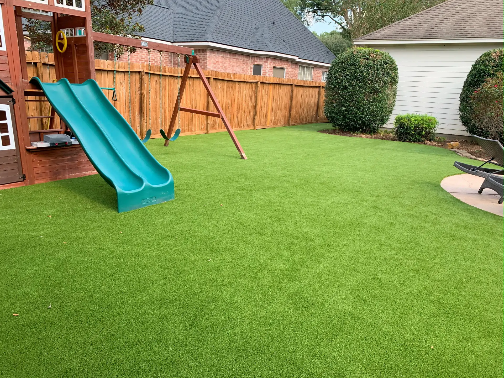 residential backyard artificial grass lawn